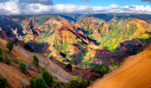 An image of Waimea Canyon, a must-see on Kauai vacations.
