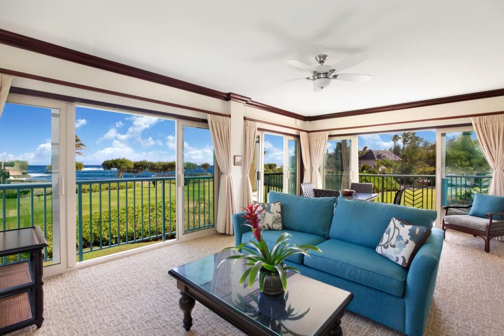 The living room area of a Kauai vacation rental near beachfront restaurants.